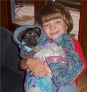 Dori Hollingsworth's grandson, Hunter with puppy Brownie