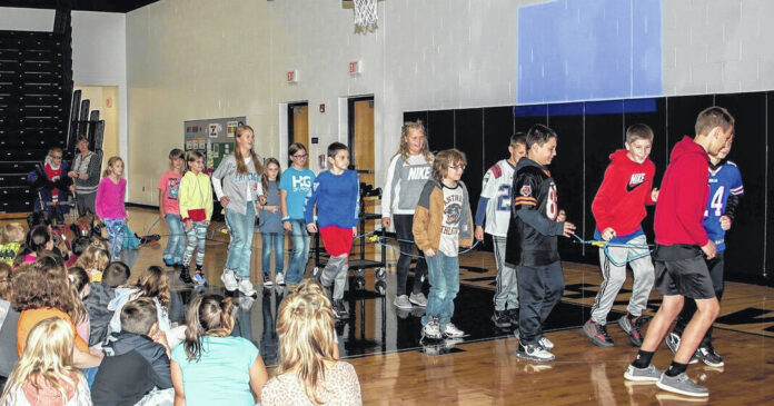 Darke County Center for the Arts’ Arts In Education series presented something entirely different to fourth through sixth grade students throughout the county. DCCA brought back former teacher and current musher Tasha Stielstra along with her sled dogs. | Article Credit: Daily Advocate