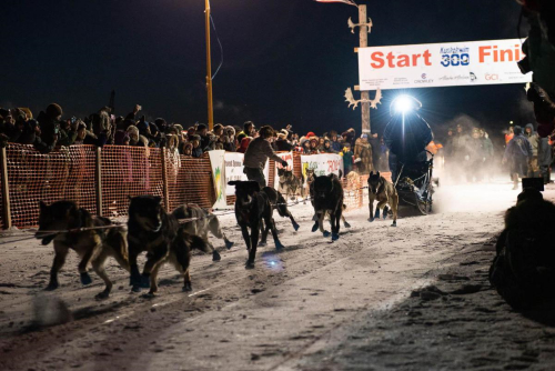 A musher leaves the starting chute during the 2018 Kuskokwim 300 Sled Dog Race in Bethel, Alaska. CREDIT KATIE BASILE / KYUK