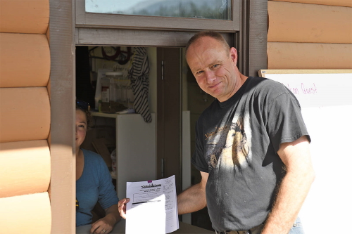 Rob Cooke was the first musher to sign up for the 2020 Yukon Quest in Whitehorse on Aug. 3. (John Hopkins-Hill/Yukon News)