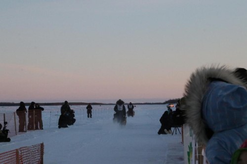 Mushers leave the starting line for the Bogus Creek 150 in Bethel, Alaska in 2019. The Bogus Creek 150, along with the other seven K300 races, will take place in 2021. CREDIT GABBY SALGADO / KYUK
