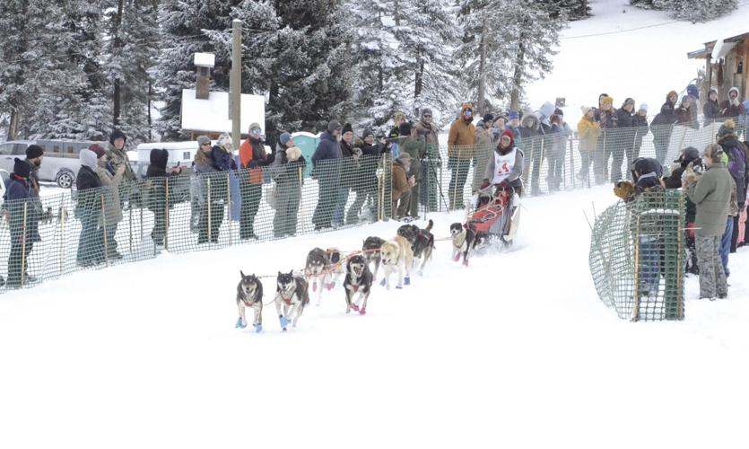 Josi Thyr of Juneau, Alaska, drives her dogs around the opening curve of the 200-mile race Thursday, Jan. 19, 2023, in this year’s Eagle Cap Extreme Sled Dog Race. Thyr, from Olney, Montana, won the 200-mile race, besting the runner-up by 90 minutes. Image Credit: Bill Bradshaw/Wallowa County Chieftain | Article Credit: Ronald Bond, Wallowa County Chieftain