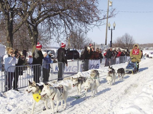 Water Street in Excelsior transformed into the finish line for the Lake Minnetonka Klondike Dog Derby in 2020. After taking a year off due to COVID-19, the event is back on for 2021. Excelsior Brewing is home to a fundraiser Sept. 11. (SUN Sailor file PHOTO BY Sahnje mcgonigle)