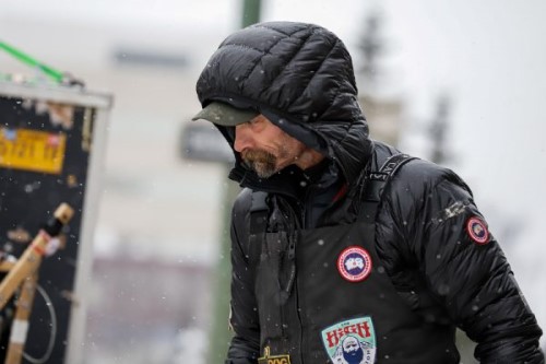 Musher Lance Mackey gets his sled dog team ready for the 2020 Iditarod Trail Sled Dog Race ceremonial start in Anchorage on Saturday, March 7, 2020. (Joey Mendolia/Alaska Public Media)
