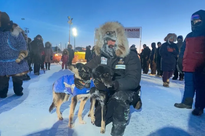 Pete Kaiser at the finish of the 45th Kuskokwim 300 on Jan. 28, 2024. | Photo credit: Kuskokwim 300, Article Credit: Suzanne Downing, mustreadalaska.com